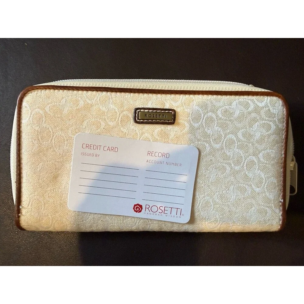 Rosetti shoulder bag with matching wallet in a white and brown color scheme.